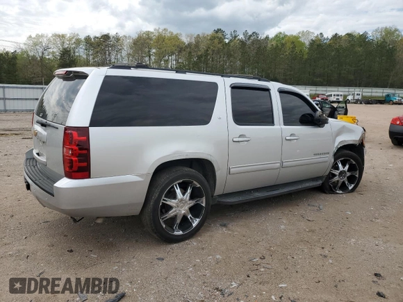 2014 Chevrolet Suburban LT z VIN 1GNSCJE00ER157634, wystawiony jako Copart lot #53271405 z przebiegiem 244 830 mil mil oraz Czysty tytuł • Clean title. Historia ofert i sprzedaży dostępna na DreamBid. Obrazek 3.