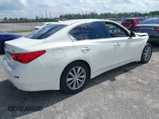 2016 Infiniti Q50 2.0t Premium with VIN JN1CV7AR9GM253439, listed as a IAAI auction lot 39334740 with 90,101 mi miles. Bid and sale history available at carsss.com. Image 4.