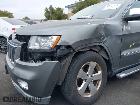 2013 Jeep Grand Cherokee Limited with VIN 1C4RJEBTXDC539433, listed as a IAAI auction lot 42046724 with 266,913 mi miles. Bid and sale history available at carsss.com. Image 6.