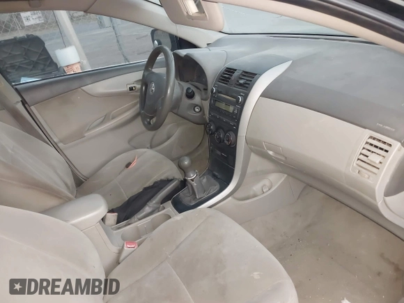 2010 Toyota Corolla with VIN 2T1BU4EE2AC300882, listed as a IAAI auction lot 41842125 with 234,967 mi miles. Bid and sale history available at carsss.com. Image 5.