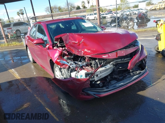 2020 Toyota Camry LE with VIN 4T1C11AK4LU916494, listed as a IAAI auction lot 41786429 with 100,032 mi miles and . Bid and sale history available at DreamBid. Image 1.