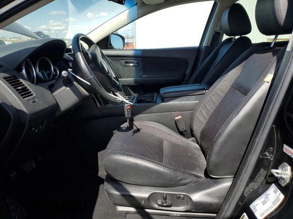 2015 Mazda CX-9 Touring z VIN JM3TB3CV1F0460073, wystawiony jako Copart lot #53841725 z przebiegiem 87 520 mil mil oraz Szkoda całkowita • Salvage title. Historia ofert i sprzedaży dostępna na DreamBid. Obrazek 7.