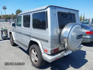 2002 Mercedes-Benz G-Class with VIN WDCYR49E02X129195, listed as a IAAI auction lot 41871996 with 200,945 mi miles. Bid and sale history available at carsss.com. Image 3.