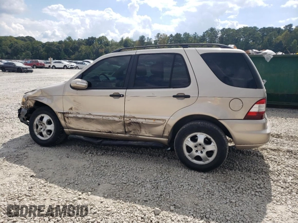 2002 Mercedes-Benz M-Class with VIN 4JGAB54E72A322046, listed as a Copart auction lot 74393084 with 128,015 mi miles and Salvage Title. Bid and sale history available at carsss.com. Image 2.