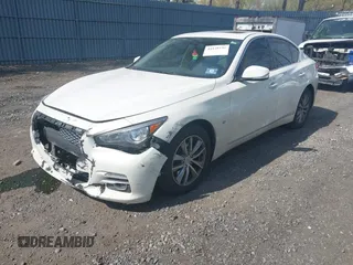 2014 Infiniti Q50 Premium with VIN JN1BV7AR5EM703788, listed as a IAAI auction lot 42118192 with 153,859 mi miles and . Bid and sale history available at DreamBid. Image 2.