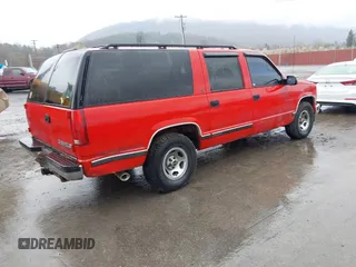 1999 Chevrolet Suburban with VIN 3GNEC16R7XG248641, listed as a IAAI auction lot 41964302 with 183,384 mi miles. Bid and sale history available at carsss.com. Image 4.
