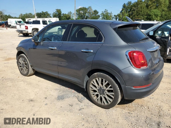 2018 FIAT 500X Lounge with VIN ZFBCFXDB5JP664130, listed as a Copart auction lot 73784574 with 67,160 mi miles and Salvage title. Bid and sale history available at DreamBid. Image 2.
