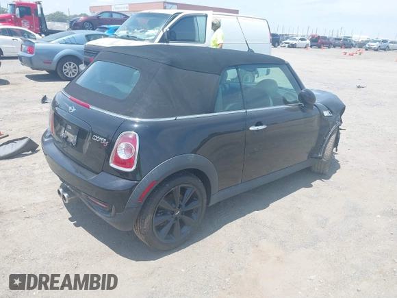 2013 MINI Convertible S with VIN WMWZP3C59DT550746, listed as a IAAI auction lot 39538986 with 59,934 mi miles and . Bid and sale history available at DreamBid. Image 4.