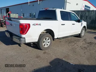2021 Ford F-150 XL with VIN 1FTEW1EP5MKE25613, listed as a IAAI auction lot 42028237 with 116,341 mi miles. Bid and sale history available at carsss.com. Image 4.