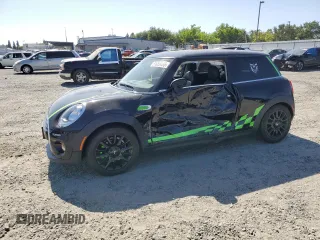 2018 MINI Hardtop Cooper with VIN WMWXP5C54J2G64015, listed as a Copart auction lot 61866865 with 32,927 mi miles and Salvage title. Bid and sale history available at DreamBid. Image 1.