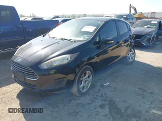 2016 Ford Fiesta SE z VIN 3FADP4EJ3GM146945, wystawiony jako IAAI lot #41975149 z przebiegiem 186 421 mil mil oraz . Historia ofert i sprzedaży dostępna na DreamBid. Obrazek 2.