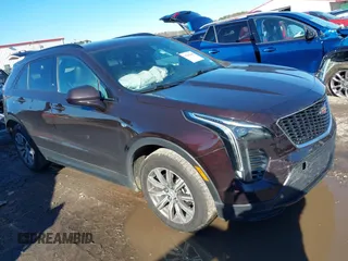 2020 Cadillac XT4 FWD Sport with VIN 1GYFZER40LF144503, listed as a IAAI auction lot 41265649 with 79,120 mi miles and . Bid and sale history available at carsss.com. Image 1.