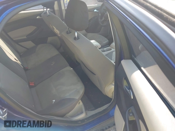 2012 Ford Focus SE z VIN 1FAHP3K28CL297610, wystawiony jako IAAI lot #41999068 z przebiegiem 164 482 mil mil oraz . Historia ofert i sprzedaży dostępna na DreamBid. Obrazek 8.