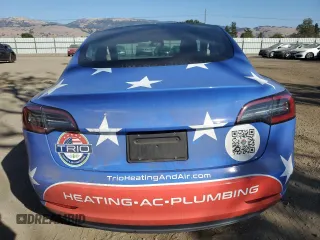 2019 Tesla Model 3 Mid Range with VIN 5YJ3E1EA4KF401500, listed as a Copart auction lot 80029064 with 100,077 mi miles and Salvage Title. Bid and sale history available at carsss.com. Image 6.