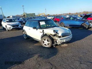 2004 MINI Hardtop with VIN WMWRC33464TJ58388, listed as a IAAI auction lot 40827409 with 102,322 mi miles and . Bid and sale history available at DreamBid. Image 1.