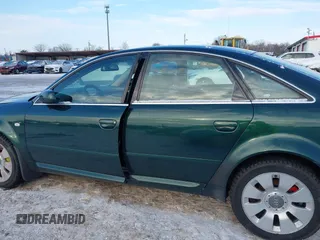 2000 Audi A6 z VIN WAUZL54B4YN013868, wystawiony jako IAAI lot #41314850 z przebiegiem 222 552 mil mil oraz . Historia ofert i sprzedaży dostępna na DreamBid. Obrazek 14.