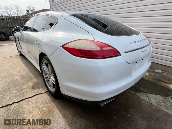 2013 Porsche Panamera z VIN WP0AA2A74DL016182, wystawiony jako Copart lot #79581904 z przebiegiem 119 089 mil mil oraz Szkoda całkowita • Salvage title. Historia ofert i sprzedaży dostępna na DreamBid. Obrazek 3.