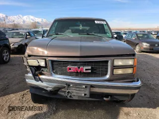 1998 GMC Suburban z VIN 3GKFK16R4WG507685, wystawiony jako Copart lot #87900735 z przebiegiem 183 033 mil mil oraz Szkoda całkowita • Salvage title. Historia ofert i sprzedaży dostępna na DreamBid. Obrazek 5.
