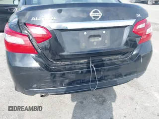 2018 Nissan Altima SR with VIN 1N4AL3AP7JC279459, listed as a IAAI auction lot 41901831 with 104,798 mi miles and . Bid and sale history available at DreamBid. Image 6.
