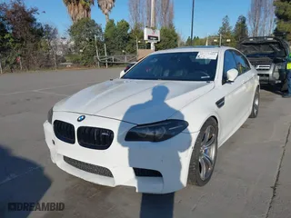 2014 BMW M5 with VIN WBSFV9C55ED593614, listed as a IAAI auction lot 41777369 with 144,076 mi miles. Bid and sale history available at carsss.com. Image 6.