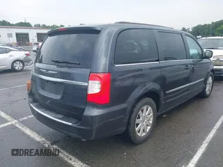 2014 Chrysler Town & Country Touring z VIN 2C4RC1BG4ER439889, wystawiony jako IAAI lot #39977311 z przebiegiem 155 656 mil mil oraz . Historia ofert i sprzedaży dostępna na DreamBid. Obrazek 4.