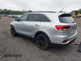 2019 Kia Sorento LX with VIN 5XYPGDA54KG588767, listed as a IAAI auction lot 42683621 with 90,395 mi miles and . Bid and sale history available at DreamBid. Image 3.