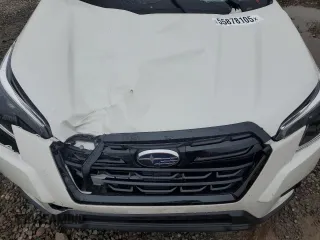 2024 Subaru Forester Premium z VIN JF2SKACC0RH497985, wystawiony jako Copart lot #55878105 z przebiegiem 11 503 mil mil oraz Szkoda całkowita • Salvage title. Historia ofert i sprzedaży dostępna na DreamBid. Obrazek 12.