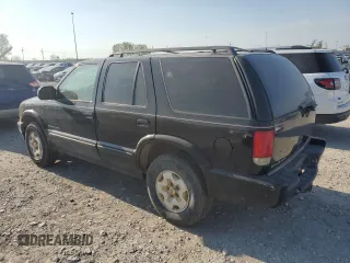 1999 Chevrolet Blazer Trailblazer z VIN 1GNDT13W2X2130625, wystawiony jako Copart lot #50596885 z przebiegiem 187 444 mil mil oraz Czysty tytuł • Clean title. Historia ofert i sprzedaży dostępna na DreamBid. Obrazek 2.