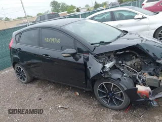 2019 Ford Fiesta SE with VIN 3FADP4EJ9KM135957, listed as a IAAI auction lot 42279365 with 170,696 mi miles and . Bid and sale history available at DreamBid. Image 13.