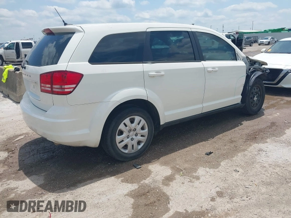2013 Dodge Journey SE z VIN 3C4PDCAB1DT715883, wystawiony jako IAAI lot #42188089 z przebiegiem 111 905 mil mil oraz . Historia ofert i sprzedaży dostępna na DreamBid. Obrazek 4.
