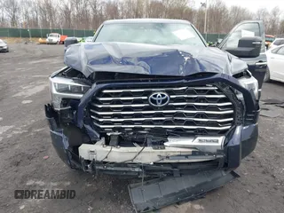 2022 Toyota Tundra Capstone Hybrid with VIN 5TFVC5DB5NX009829, listed as a IAAI auction lot 41983391 with 70,015 mi miles and . Bid and sale history available at DreamBid. Image 6.