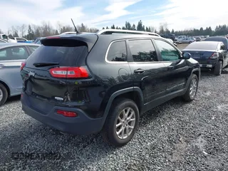 2014 Jeep Cherokee Latitude with VIN 1C4PJMCS0EW169696, listed as a IAAI auction lot 41647691 with 98,919 mi miles. Bid and sale history available at carsss.com. Image 4.