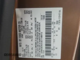 2014 Ford Transit Connect Titanium z VIN NM0GE9G72E1148012, wystawiony jako Copart lot #50765065 z przebiegiem 142 169 mil mil oraz Szkoda całkowita • Salvage title. Historia ofert i sprzedaży dostępna na DreamBid. Obrazek 13.