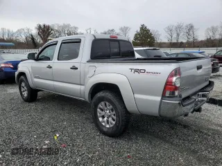 2011 Toyota Tacoma PreRunner with VIN 3TMJU4GN3BM121395, listed as a Copart auction lot 48346825 with 179,469 mi miles and Salvage Title. Bid and sale history available at DreamBid. Image 2.