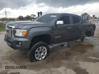 2016 GMC Canyon 4WD SLT with VIN 1GTG6DE37G1259533, listed as a Copart auction lot 61441975 with 121,797 mi miles and Clean title. Bid and sale history available at DreamBid. Image 1.