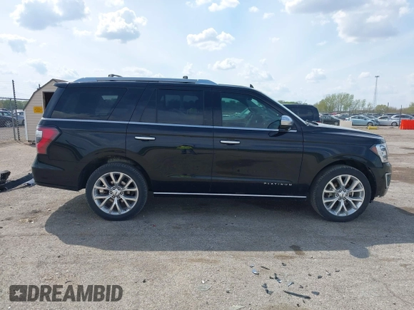 2019 Ford Expedition Platinum with VIN 1FMJU1MT2KEA09318, listed as a IAAI auction lot 42100876 with 90,330 mi miles and . Bid and sale history available at DreamBid. Image 14.