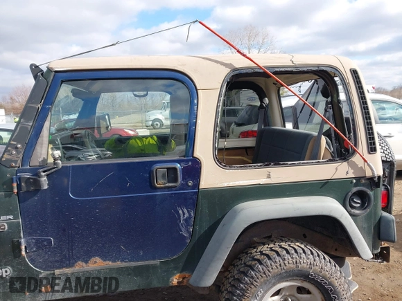 1997 Jeep Wrangler SE with VIN 1J4FY29PXVP406939, listed as a IAAI auction lot 41612380 with 248,314 mi miles. Bid and sale history available at carsss.com. Image 19.