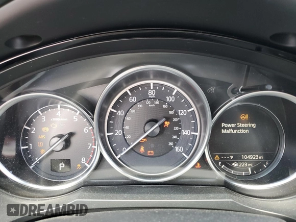 2016 Mazda CX-9 Grand Touring с VIN JM3TCADY2G0121026, выставлен на аукционе Copart как лот 60518105 с пробегом 104 923 миль миль и Списание • Salvage title. История ставок и продаж доступна на DreamBid. Изображение 9.
