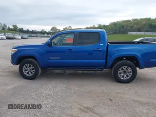 2018 Toyota Tacoma SR5 with VIN 3TMAZ5CNXJM069212, listed as a IAAI auction lot 42010564 with 73,825 mi miles and . Bid and sale history available at DreamBid. Image 14.