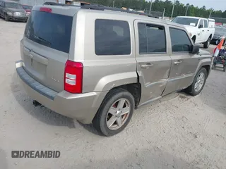 2010 Jeep Patriot Sport with VIN 1J4NF1GB9AD620237, listed as a IAAI auction lot 42079617 with 146,545 mi miles. Bid and sale history available at carsss.com. Image 4.