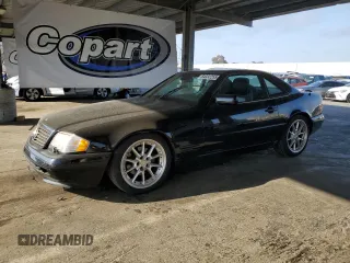 1998 Mercedes-Benz SL 500 with VIN WDBFA67F1WF167699, listed as a Copart auction lot 64332255 with 94,282 mi miles and Salvage title. Bid and sale history available at DreamBid. Image 1.