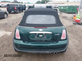 2005 MINI Convertible with VIN WMWRF33495TG11818, listed as a IAAI auction lot 42351446 with 100,033 mi miles and . Bid and sale history available at DreamBid. Image 16.
