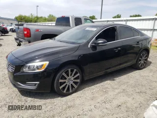 2015 Volvo S60 T6 Drive-E Platinum with VIN YV149MFM1F1337010, listed as a Copart auction lot 53095655 with 83,842 mi miles and Salvage title. Bid and sale history available at DreamBid. Image 1.