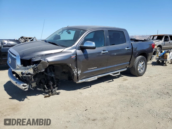 2012 Toyota Tundra 4WD Truck LTD with VIN 5TFHY5F13CX220317, listed as a Copart auction lot 73597184 with 127,307 mi miles and Salvage Title. Bid and sale history available at carsss.com. Image 1.
