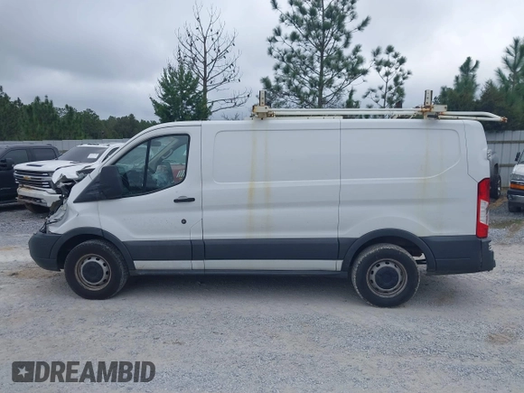 2016 Ford Transit Cargo z VIN 1FTYE1YMXGKB48964, wystawiony jako IAAI lot #41227860 z przebiegiem Nie podano mil oraz . Historia ofert i sprzedaży dostępna na DreamBid. Obrazek 15.