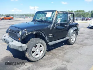 2008 Jeep Wrangler Sahara with VIN 1J4FA54188L541664, listed as a IAAI auction lot 39784204 with 145,145 mi miles and . Bid and sale history available at DreamBid. Image 2.