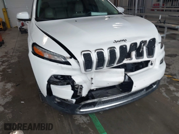 2016 Jeep Cherokee Limited z VIN 1C4PJLDB6GW355058, wystawiony jako IAAI lot #42231943 z przebiegiem 124 656 mil mil oraz . Historia ofert i sprzedaży dostępna na DreamBid. Obrazek 6.