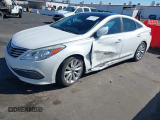 2017 Hyundai Azera Limited z VIN KMHFH4JG9HA579125, wystawiony jako IAAI lot #41718120 z przebiegiem 51 005 mil mil oraz . Historia ofert i sprzedaży dostępna na DreamBid. Obrazek 17.