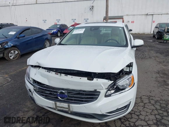 2015 Volvo S60 T5 Drive-E Premier with VIN YV126MFK4F2349564, listed as a IAAI auction lot 41711836 with 59,897 mi miles. Bid and sale history available at carsss.com. Image 6.