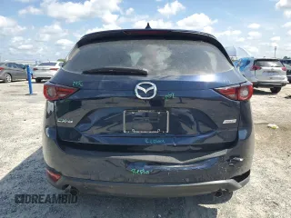 2018 Mazda CX-5 Grand Touring with VIN JM3KFADM1J1387297, listed as a Copart auction lot 60589625 with 92,283 mi miles and Non repairable. Bid and sale history available at DreamBid. Image 6.